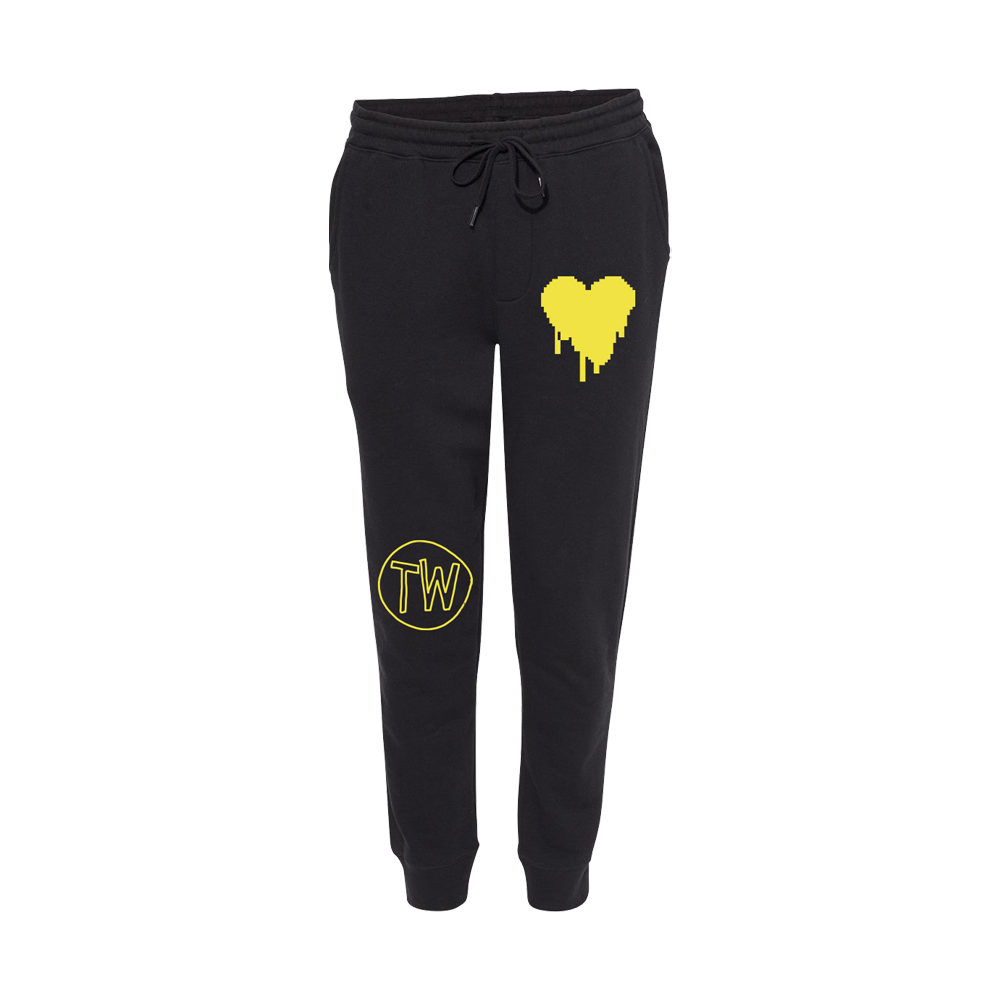 Fake it yellow drip heart TW black joggers front Tauren Wells