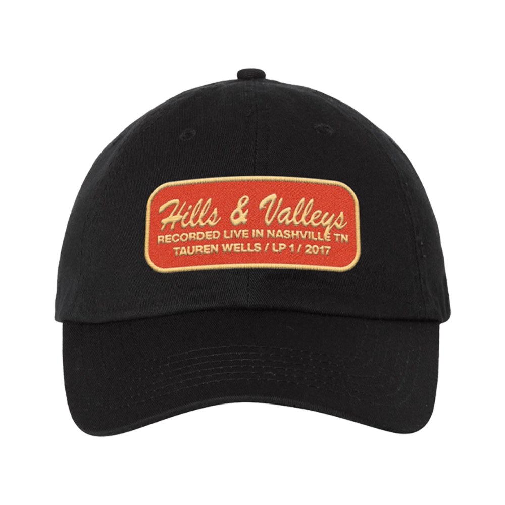 Hills and Valleys red and yellow patch black hat product shot Tauren Wells