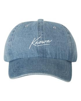 Known cursive blue denim hat product shot Tauren Wells