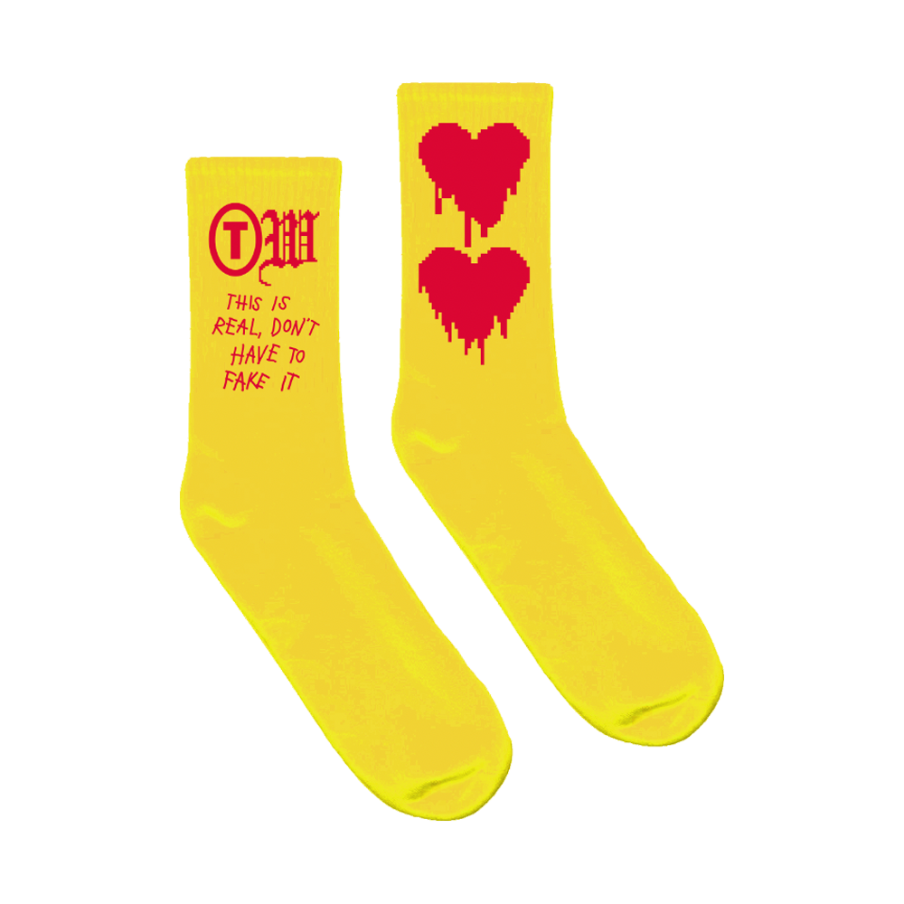 This is real don't have to fake it drip red heart yellow socks product shot Tauren Wells